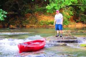 If the water is too low, walk your canoe down the falls of West Chickamauga Creek